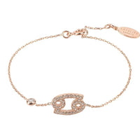 Cancer zodiac bracelet with rose-gold tone chain and oval crystal crab charm