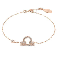 Rose gold tone bracelet with CZ zodiac pendant and adjustable clasp