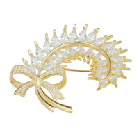 Gold-toned ribbon and laurel leaf brooch with clear rhinestone accents