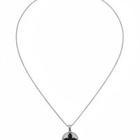 Silver four-leaf clover charm necklace on fine chain