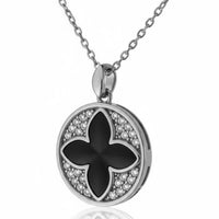 Silver round clover pendant with black enamel center and crystal border