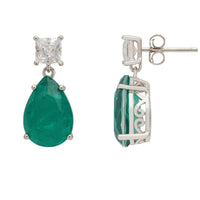 Silver backing of drop earrings with green teardrop and clear top stones
