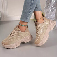 Beige chunky platform sneakers, lace-up with breathable mesh and rugged chunky outsole.
