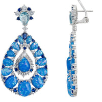 Silver drop earrings with blue teardrop gemstone clusters and visible hinge clasp
