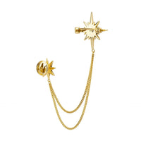 Gold starburst brooch with pin and long looped chain with small stars
