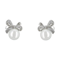 Silver bow ribbon pearl stud earrings with glittery bow and round white pearl