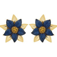 Large blue daisy flower stud earrings with gold-tone backing and textured center.