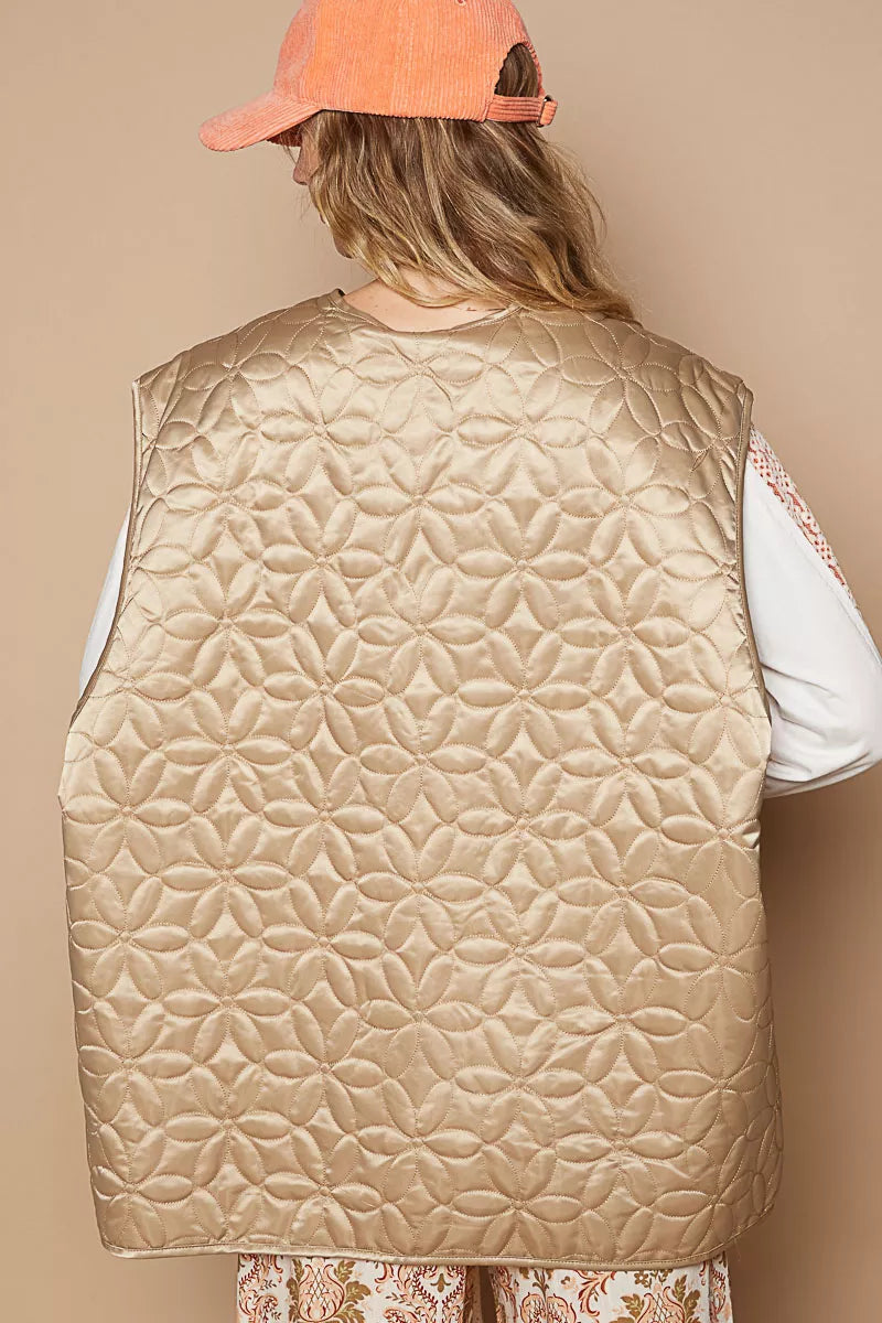 Quilted mocha vest back view with textured diamond stitching