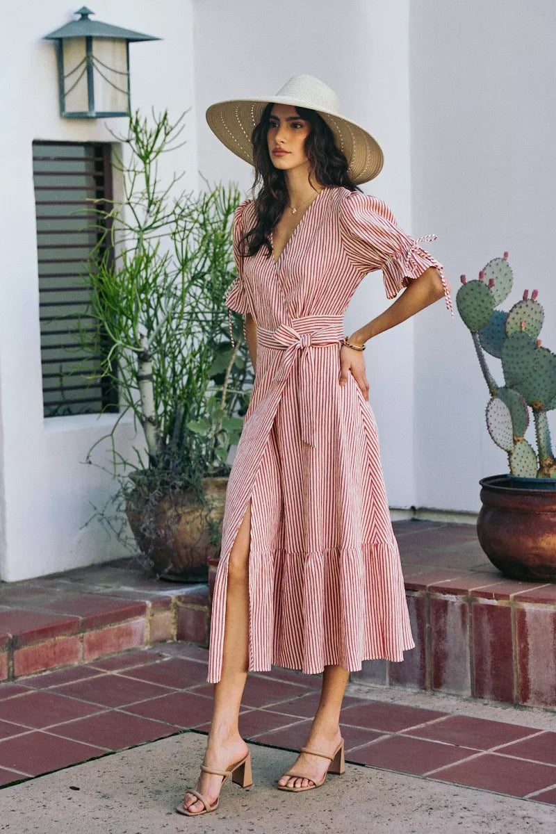 Red-and-white striped wrap midi dress with front slit, V-neck, tied waist, puff sleeves