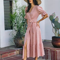 Red-and-white striped wrap midi dress with front slit, V-neck, tied waist, puff sleeves