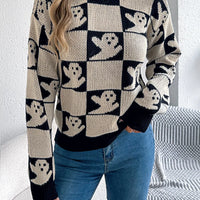Ghost checkerboard knit sweater, black and cream with ribbed crew neck and cuffs