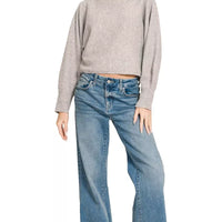 Grey boat-neck knit sweater with long sleeves and relaxed straight hem