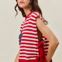Red and ivory striped sleeveless vest top with navy star patch and hanging side ties
