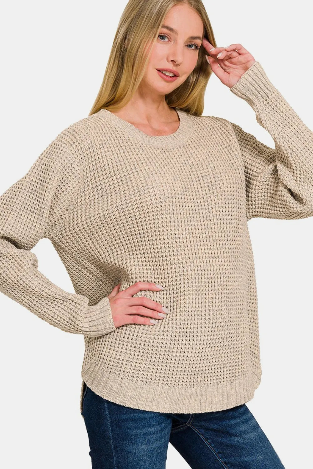 Beige waffle knit long-sleeve sweater with crew neck and ribbed cuffs
