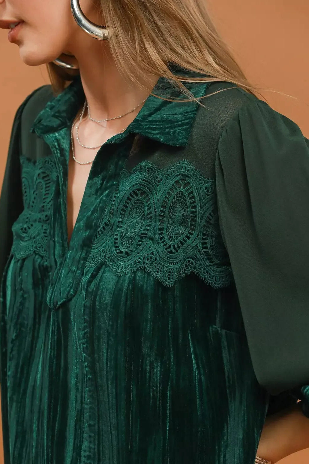 Hunter green velvet blouse with intricate lace yoke and V-neck detail
