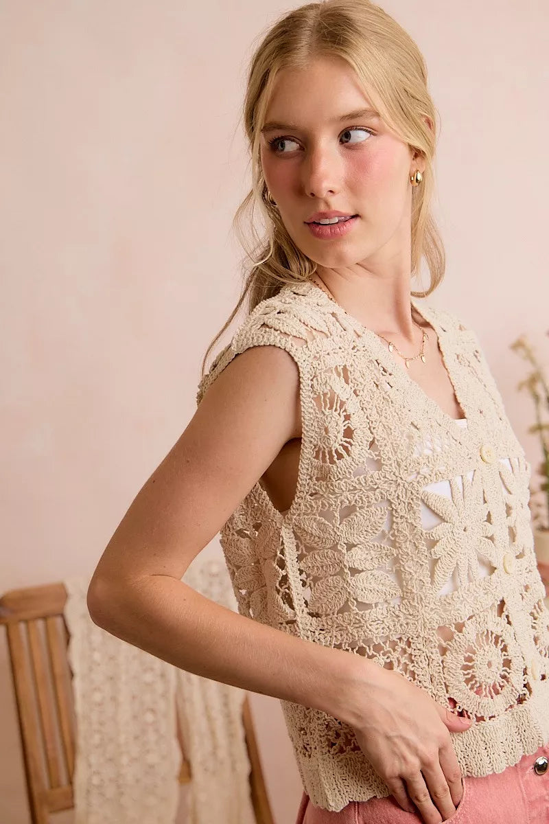 Natural crochet vest top, sleeveless V-neck with front buttons and repeating starburst motifs