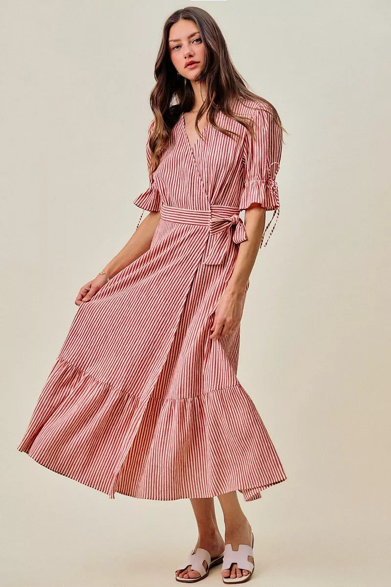 Red and white striped wrap midi dress with puff sleeves and belted waist, tiered skirt