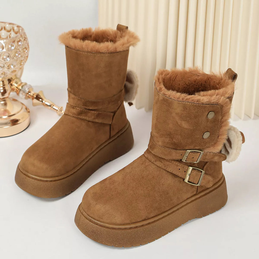 Camel round-toe platform boots with button detail, buckles, and fuzzy top