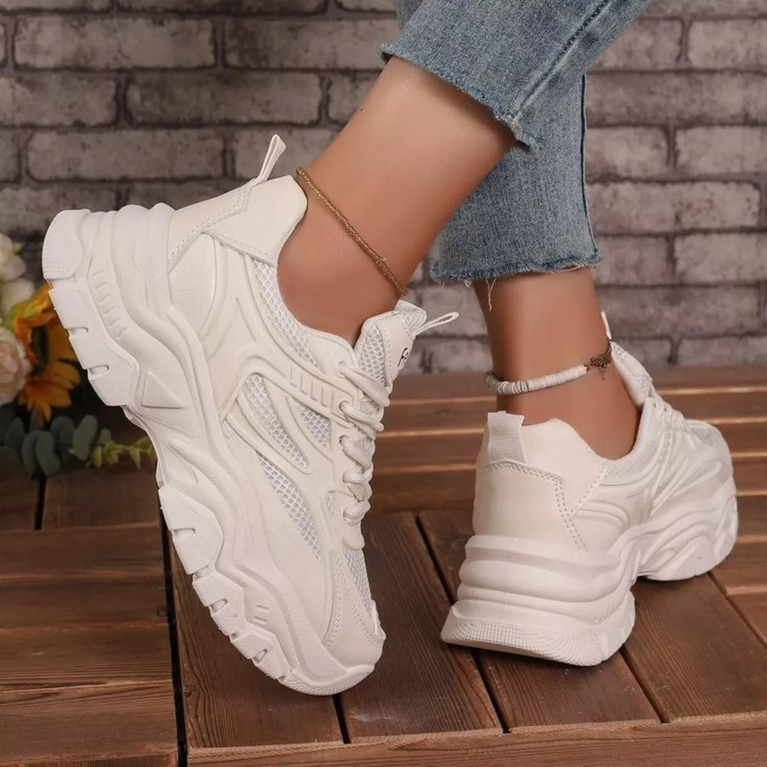 White lace-up chunky platform sneakers with textured side and thick ridged sole