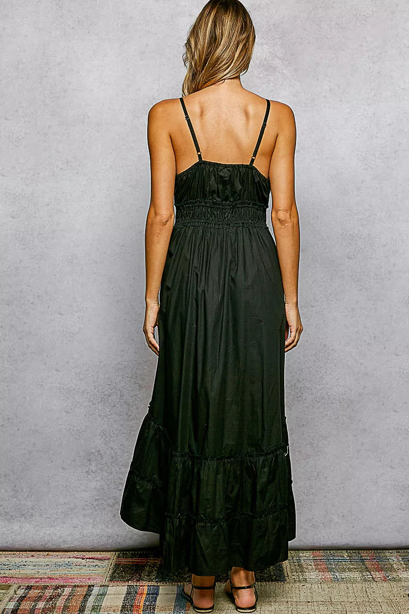 Black smocked-waist cami midi dress, back view with tiered ruffle hem