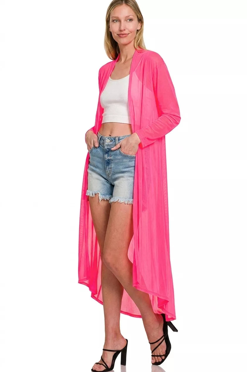 Fuchsia mesh open-front cardigan over denim shorts with long sleeves