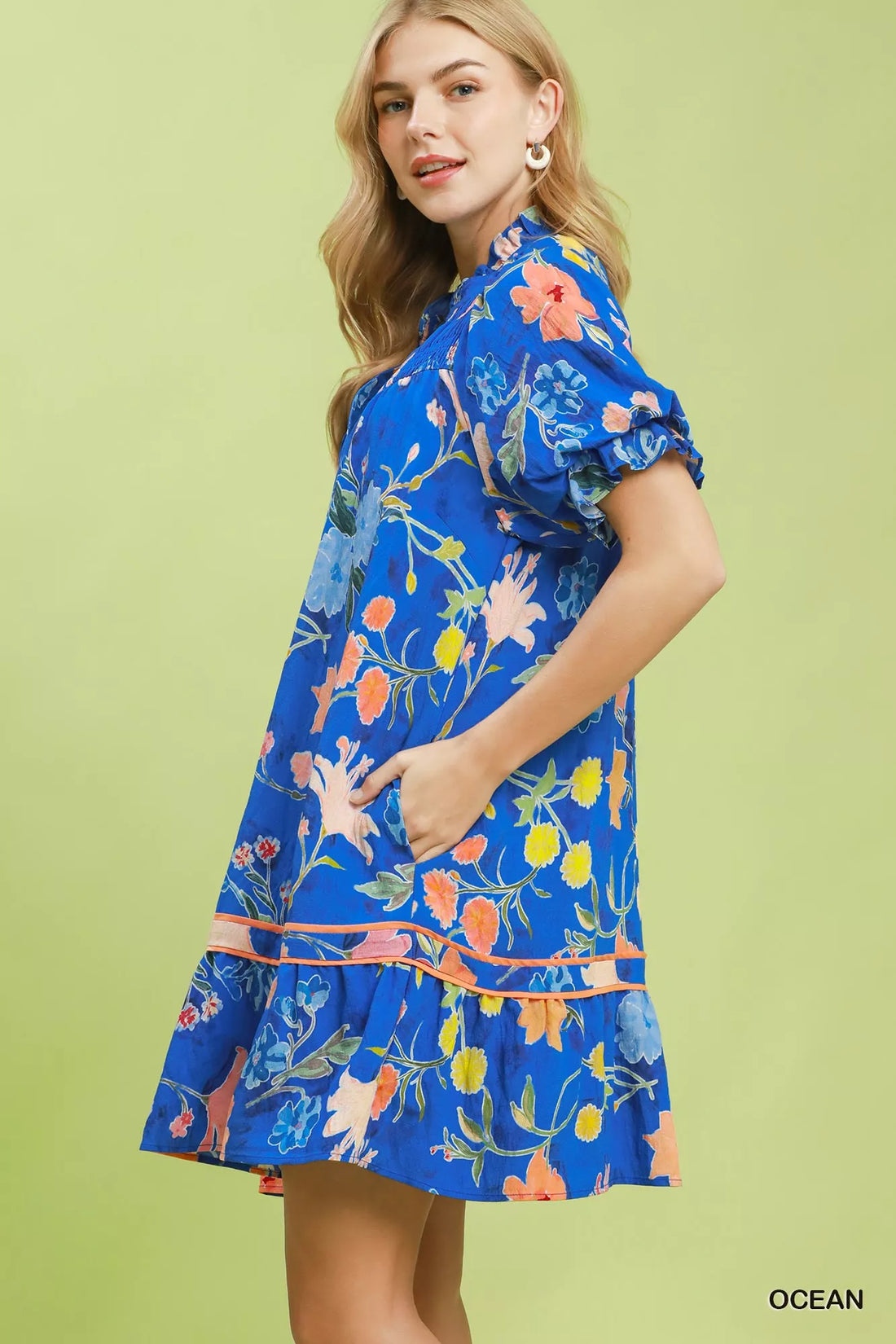 Blue floral mini dress with ruffled puff sleeves and tie belt detail