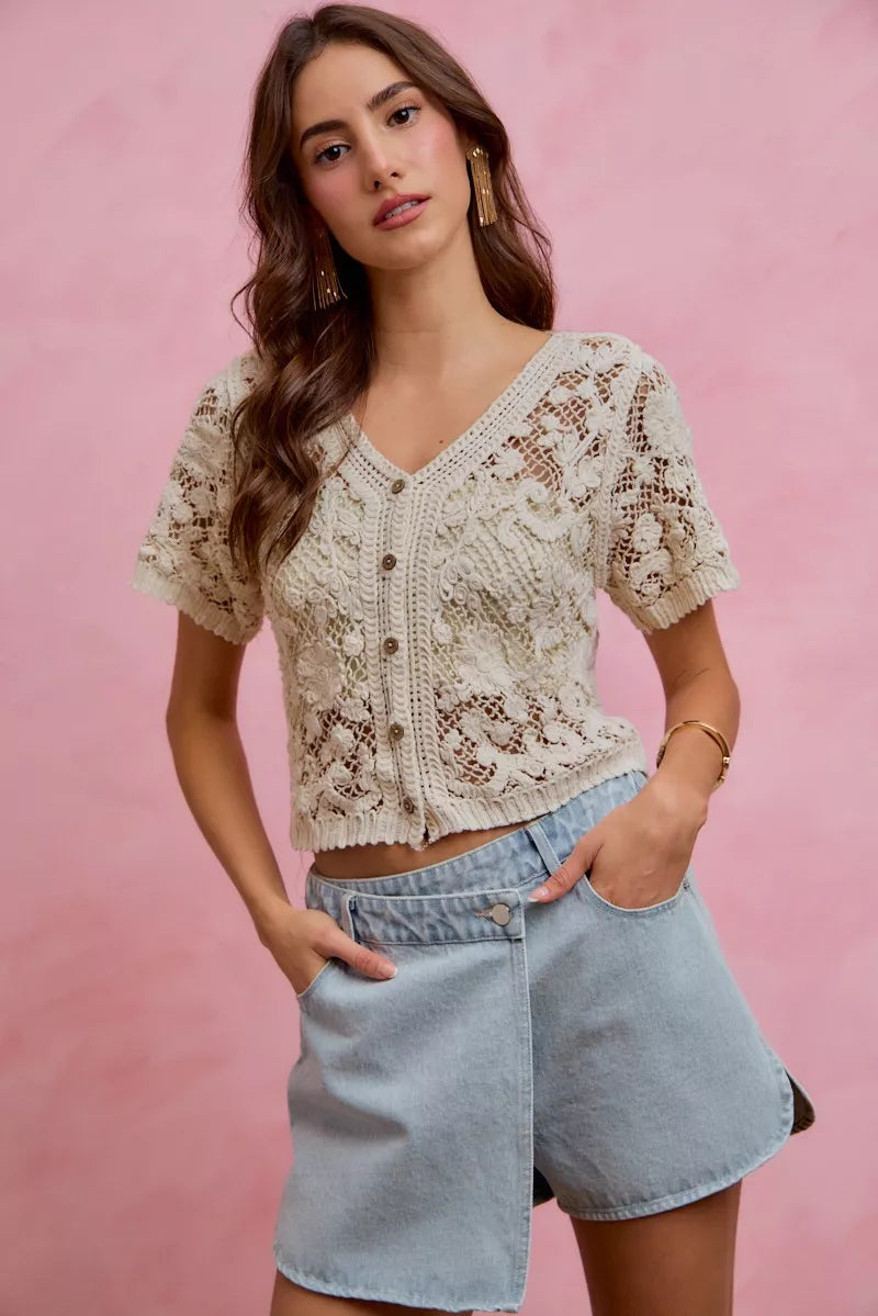 Light blue denim wrap skort with button front and side pockets