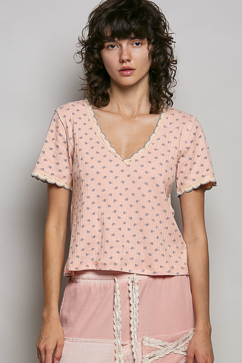 Soft pink floral V-neck T-shirt with lace-trimmed neckline and short sleeves