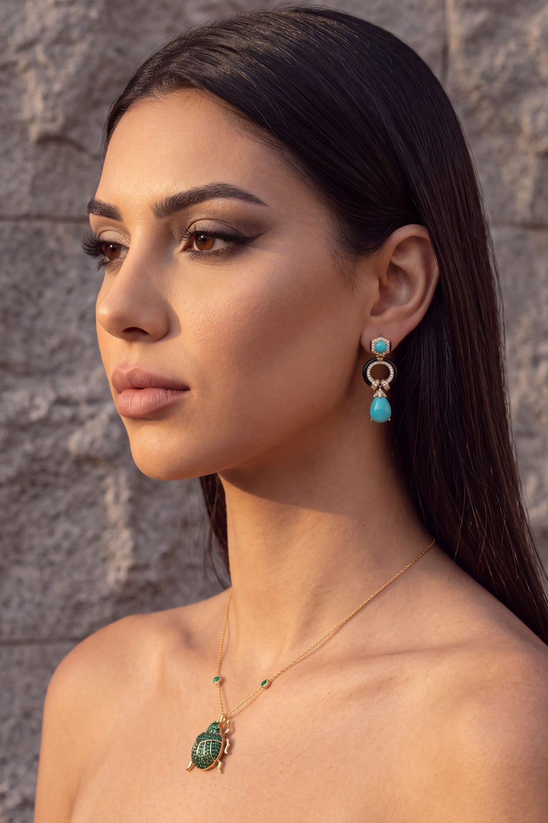 Turquoise enamel drop earrings with gold-tone rings and blue teardrop drops