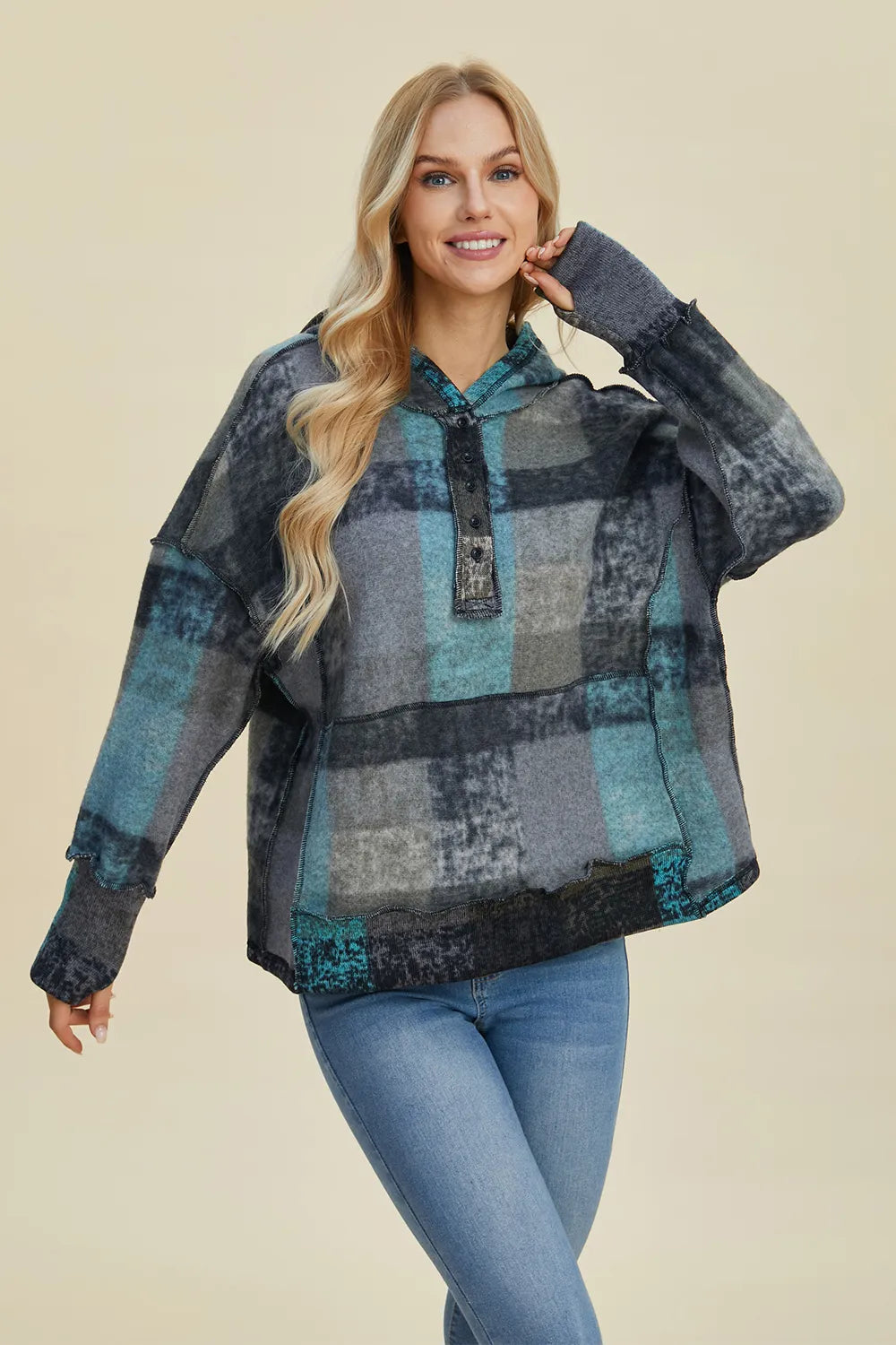 Plaid fleece hoodie with dropped shoulders, half-zip placket, kangaroo pocket, long sleeves.
