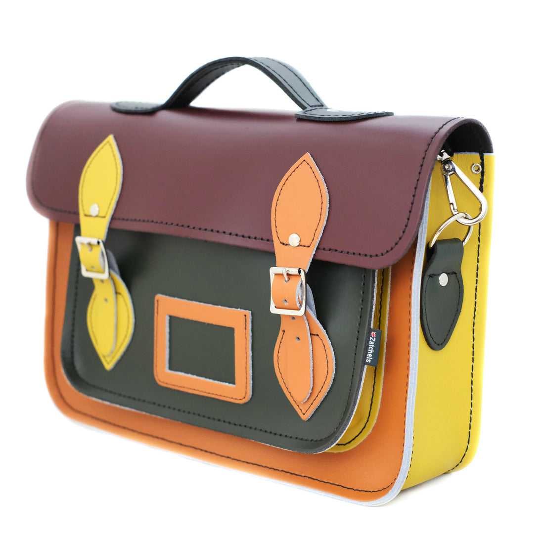 Handmade leather satchel side view, plum flap, teal front panel, yellow side strap