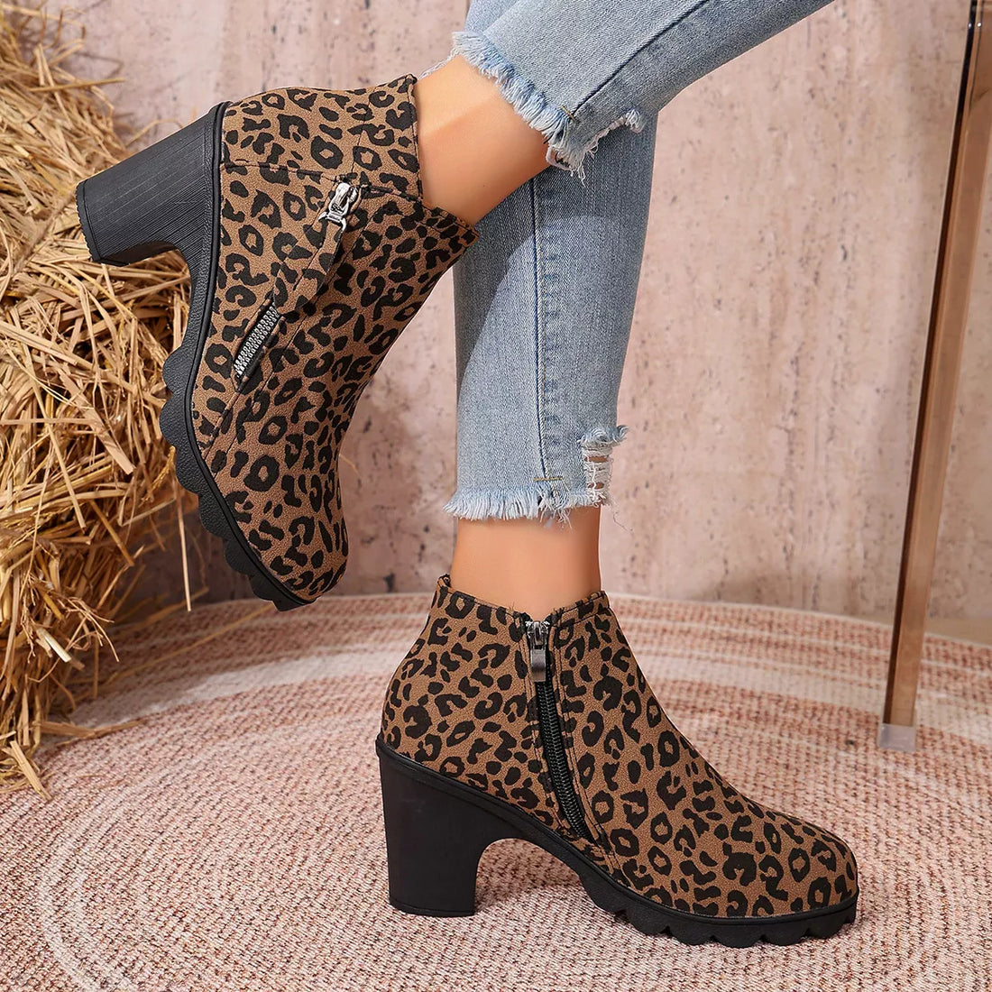 Leopard print suede ankle boots with round toe, block heel, and side zipper