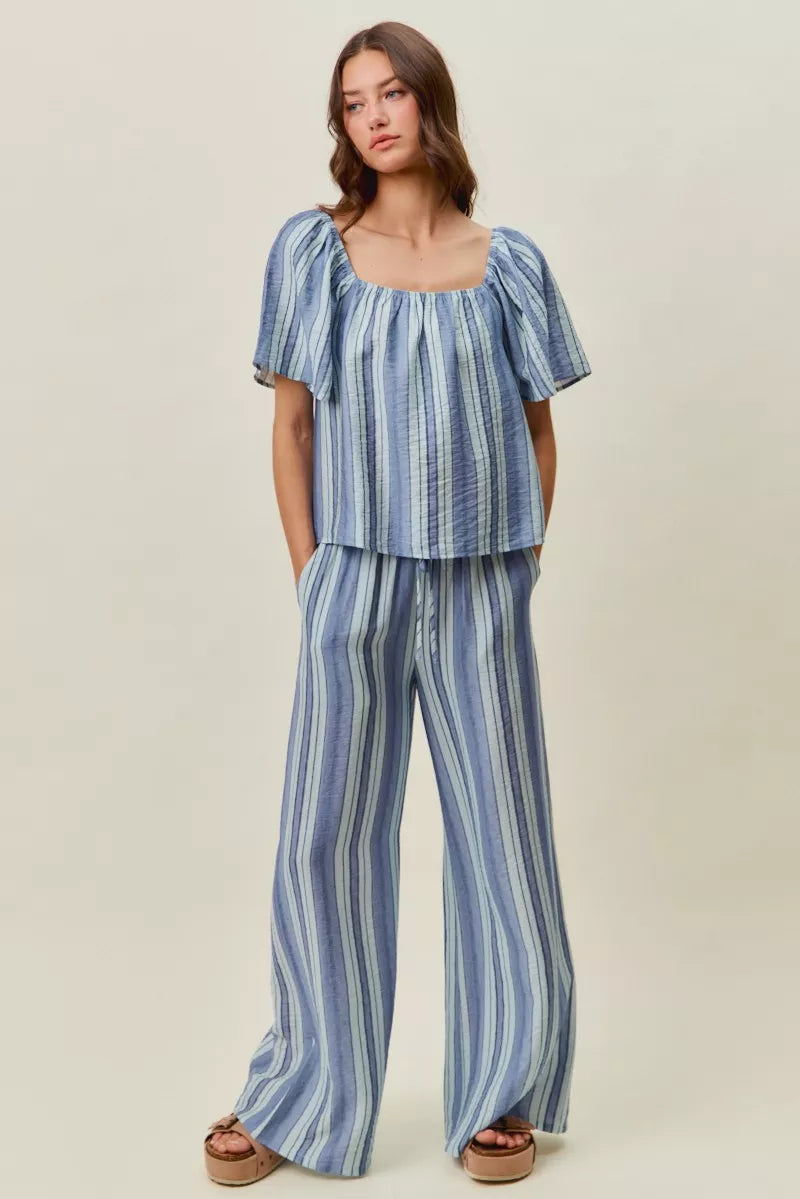 Blue striped wide-leg pull-on pants in vertical lines with elastic waist