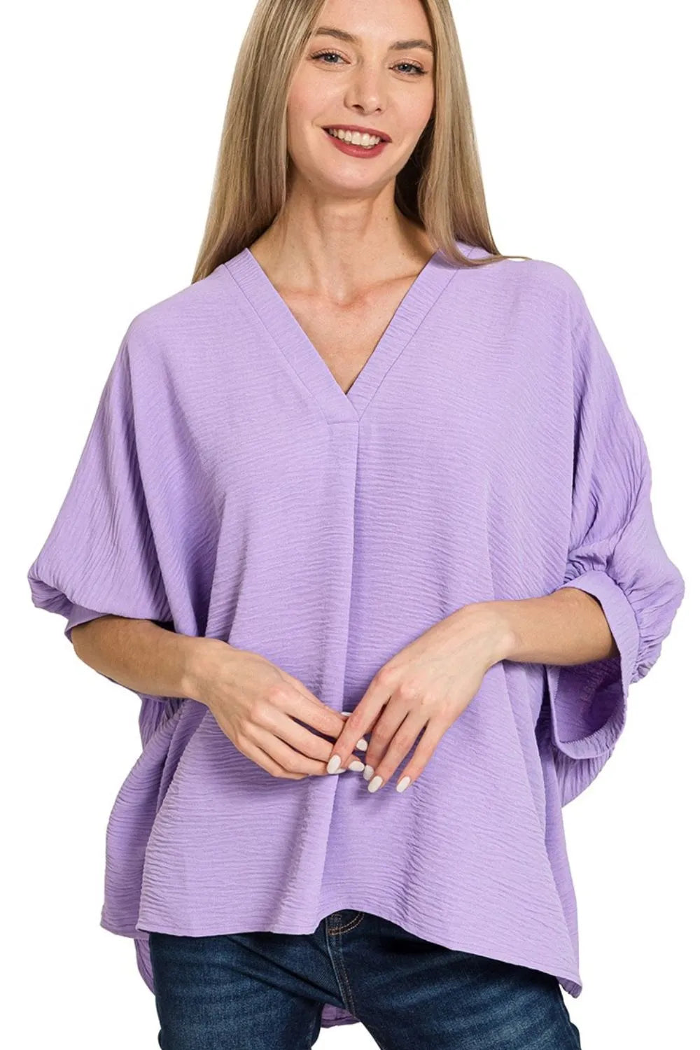 Lavender V-neck woven top with puff half-sleeves and relaxed drape