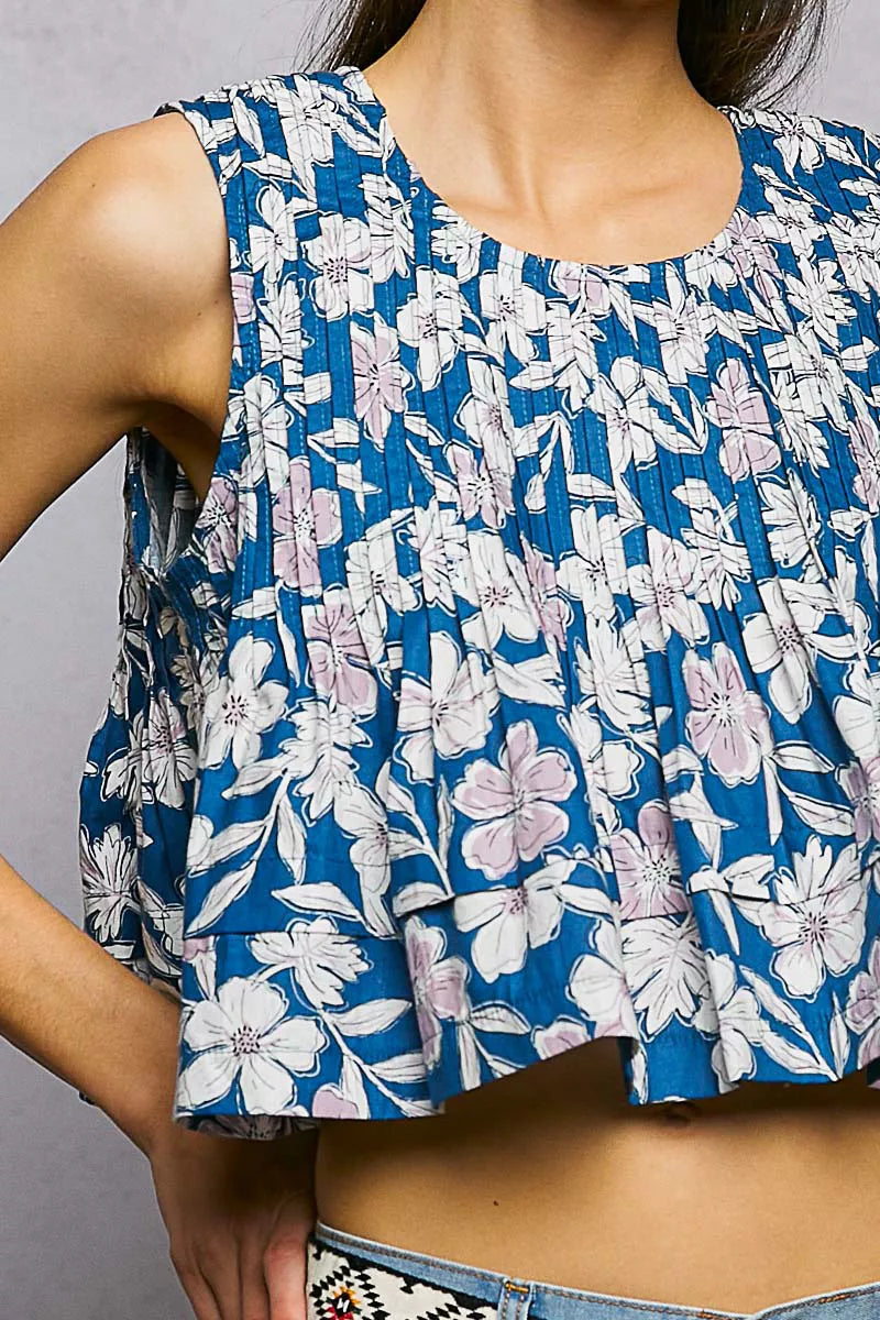 Navy floral pintuck sleeveless cropped tank top, close-up of pleated texture