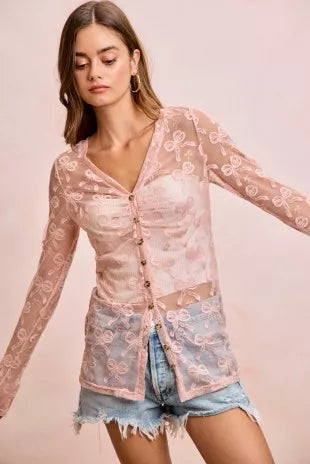 Dusty rose mesh V-neck button cardigan with allover bow-pattern, long sleeves and curved hem