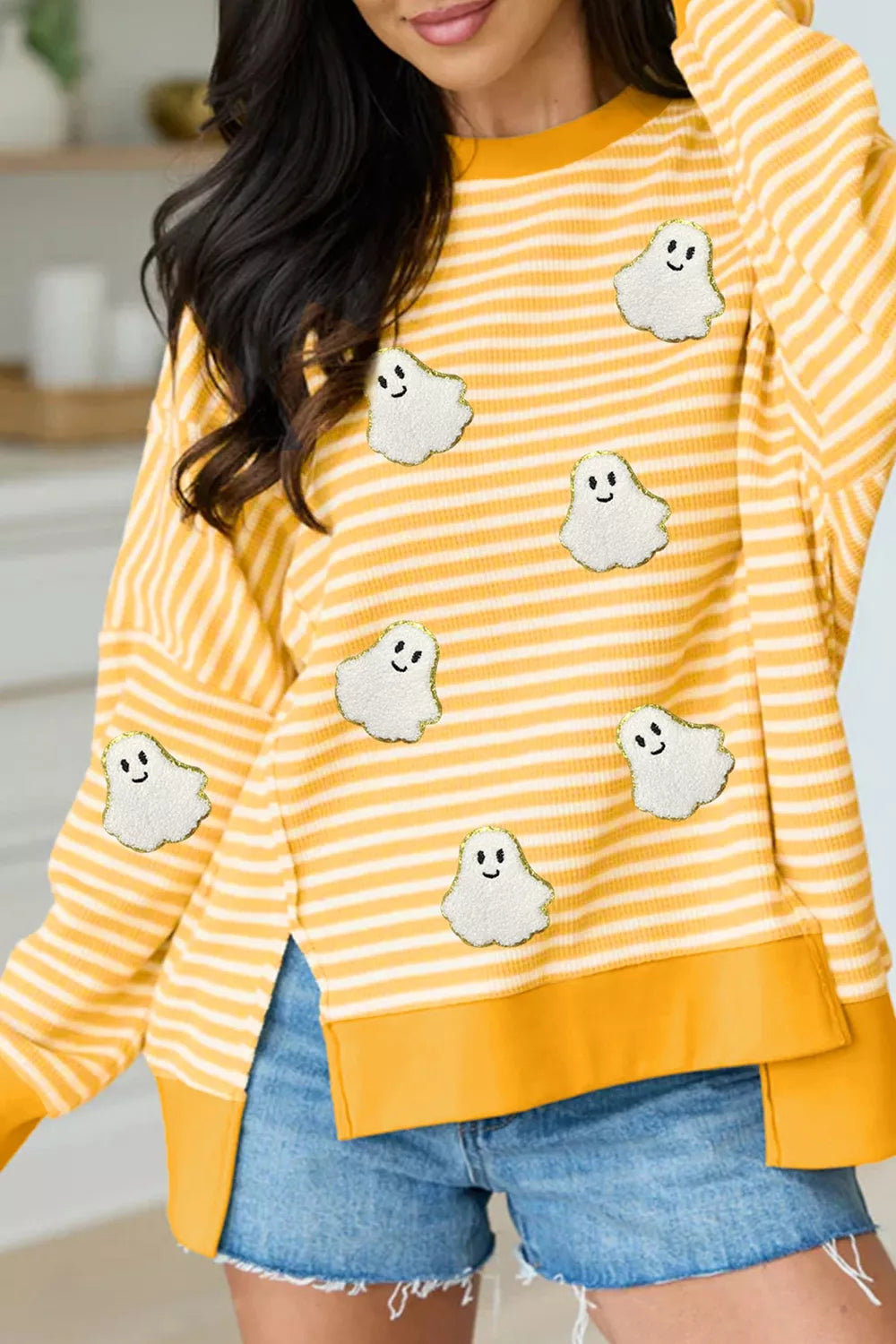 Yellow and white striped long-sleeve top with ghost patches, round neck