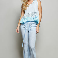 Powder blue ribbed tank with floral print yoke and layered ruffle at waist