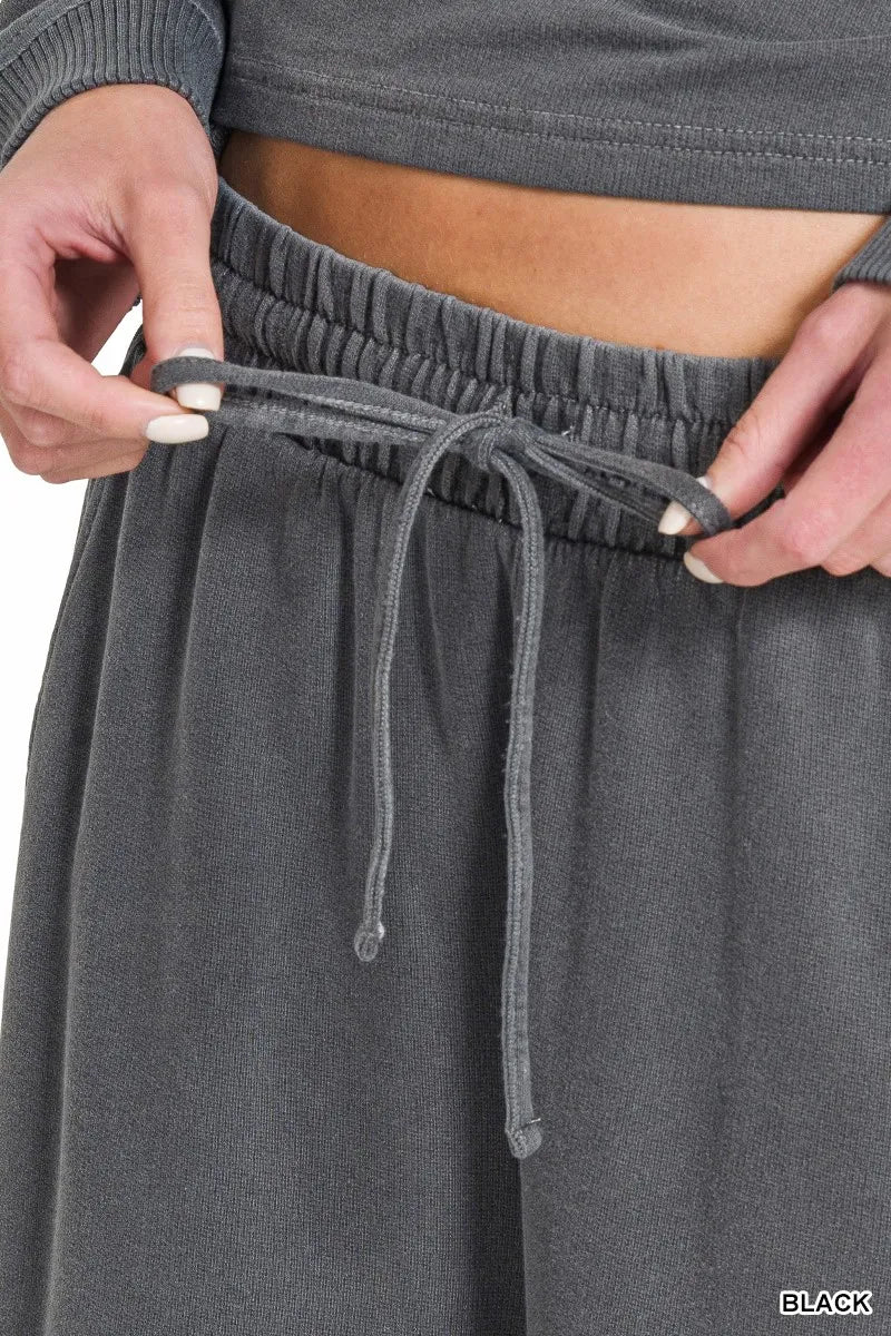 Dark gray pants waistband with drawstring and elastic back