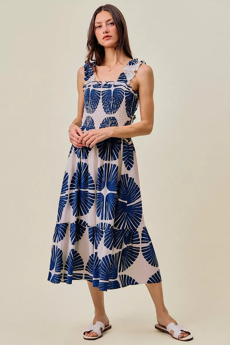 Navy abstract print tiered midi dress with smocked bodice and ruffled straps