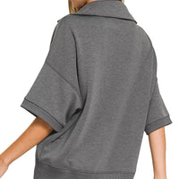 Charcoal collared short-sleeve pullover, back view with seam detail
