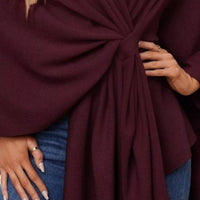 Burgundy cape shawl detail with gathered pleats and center front tie