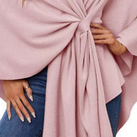 Blush pink cape shawl detail with gathered pleats and center front tie