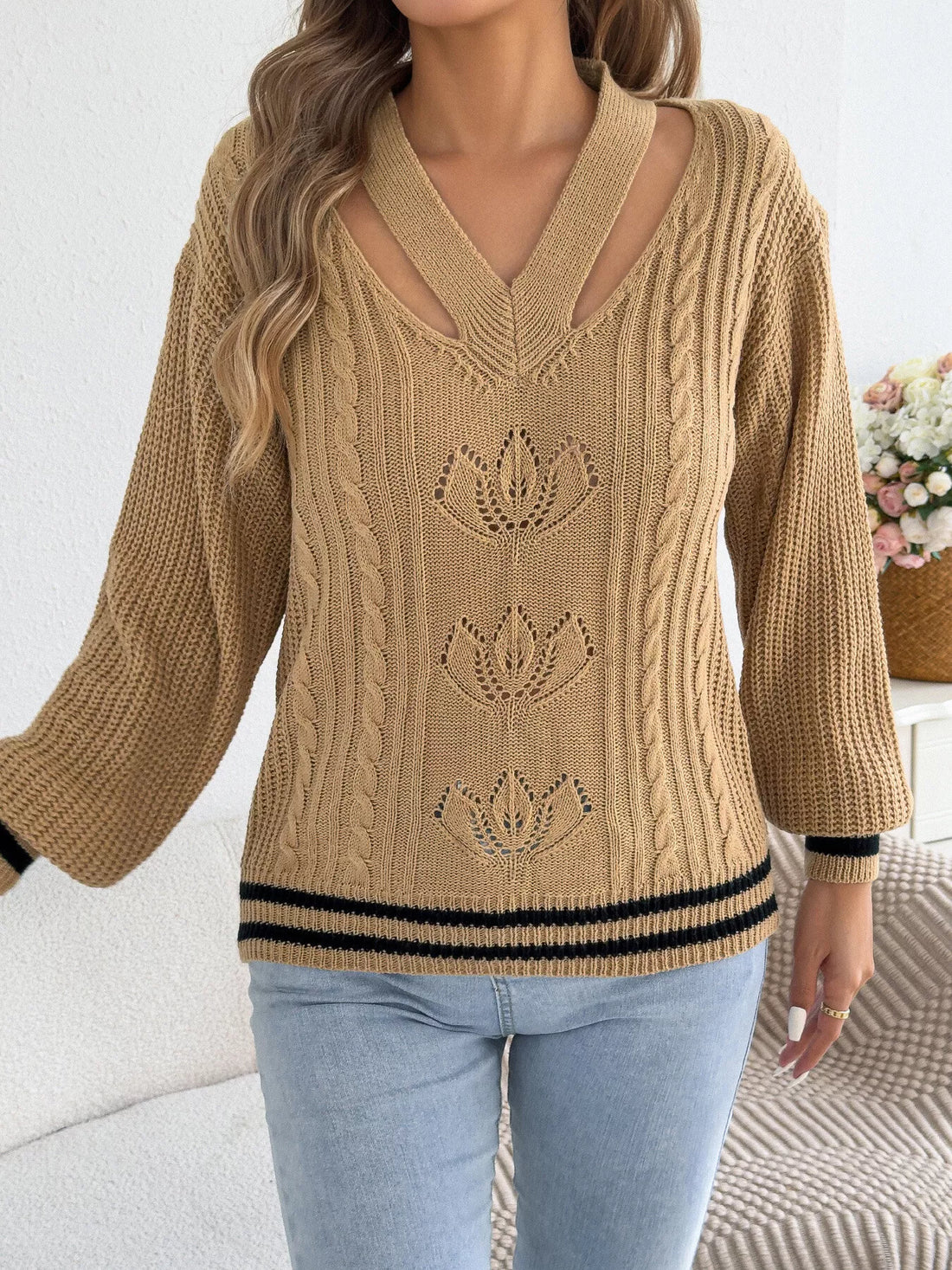 Camel cutout cable knit sweater with ribbed V-neck and striped hem