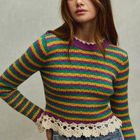Striped cropped knit top with purple neckline and scalloped crochet hem detail