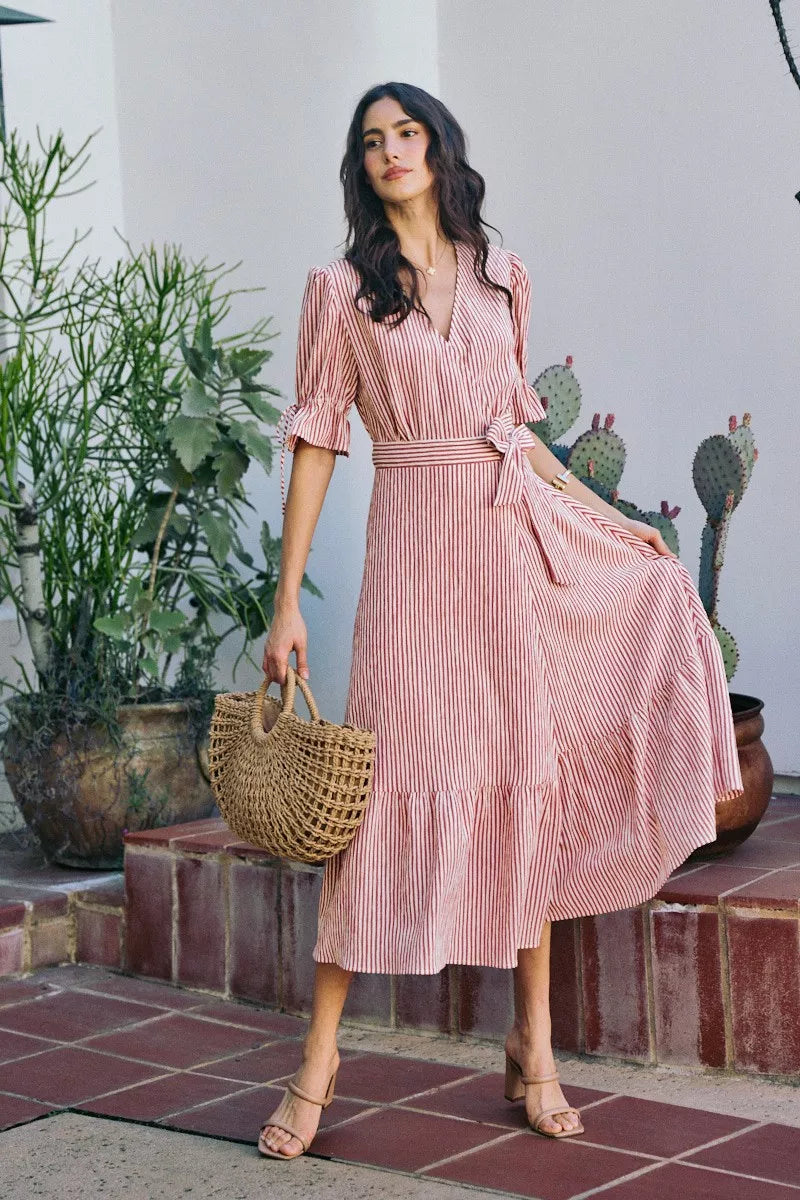 Red-and-white striped wrap midi dress, V-neck and tied waist, short puff sleeves