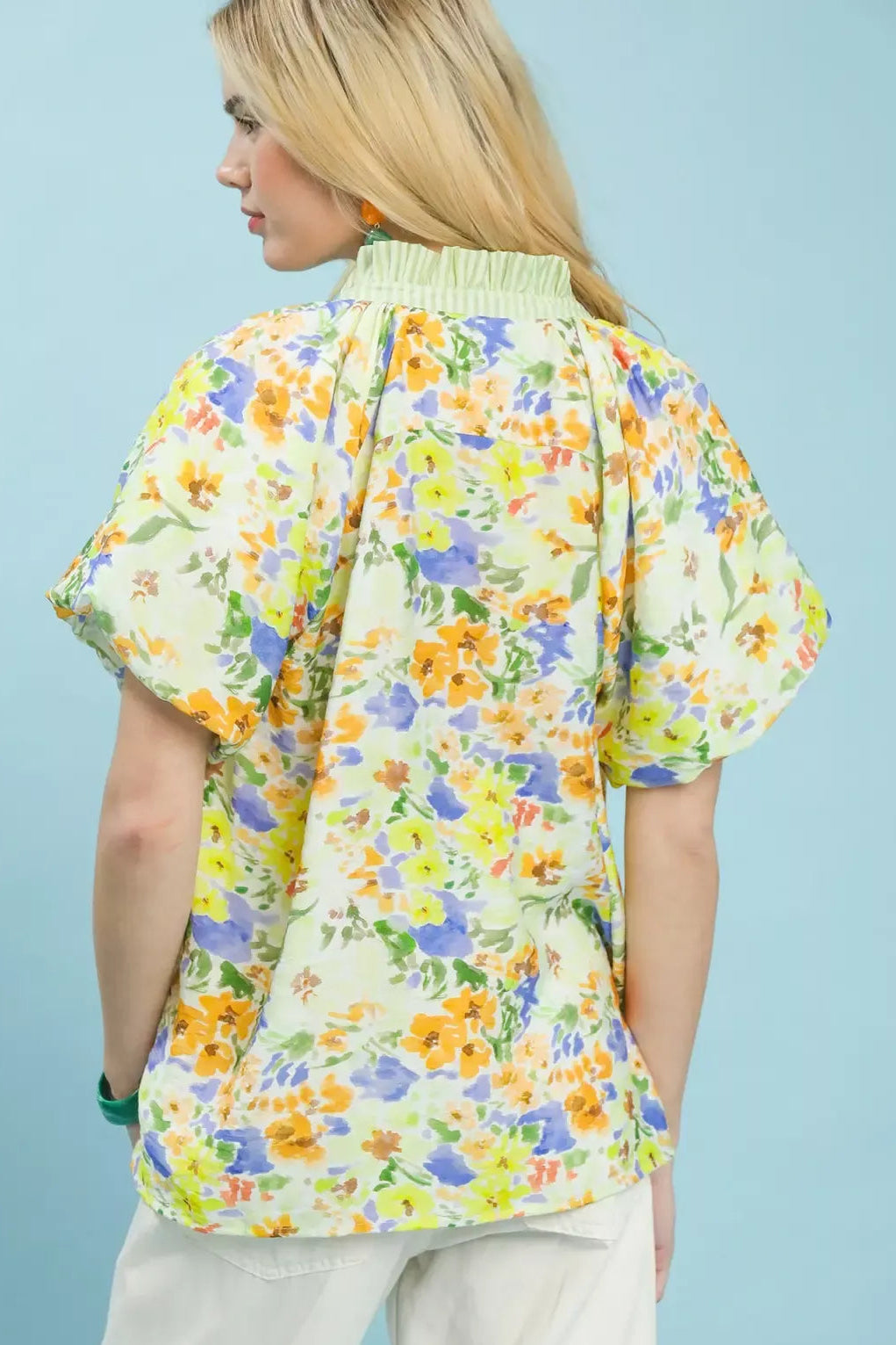 Green watercolor floral peasant blouse with gathered back yoke and short flutter sleeves
