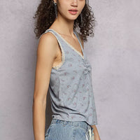 Powder blue ruched floral V-neck tank with scalloped lace trim on neckline