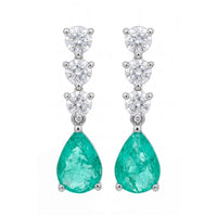 Silver triple drop earrings with teal teardrop stones and round diamond accents