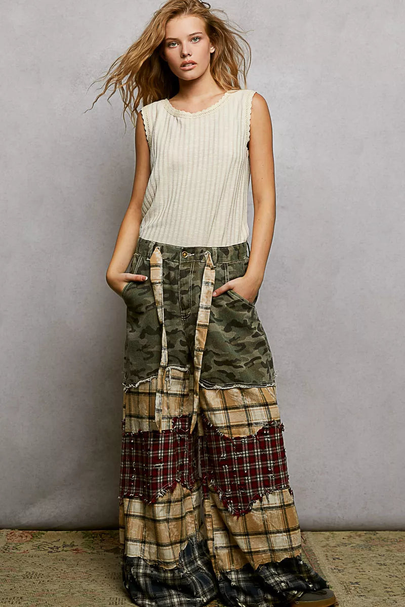 Beige ribbed tank top with lace trim at neckline and armholes
